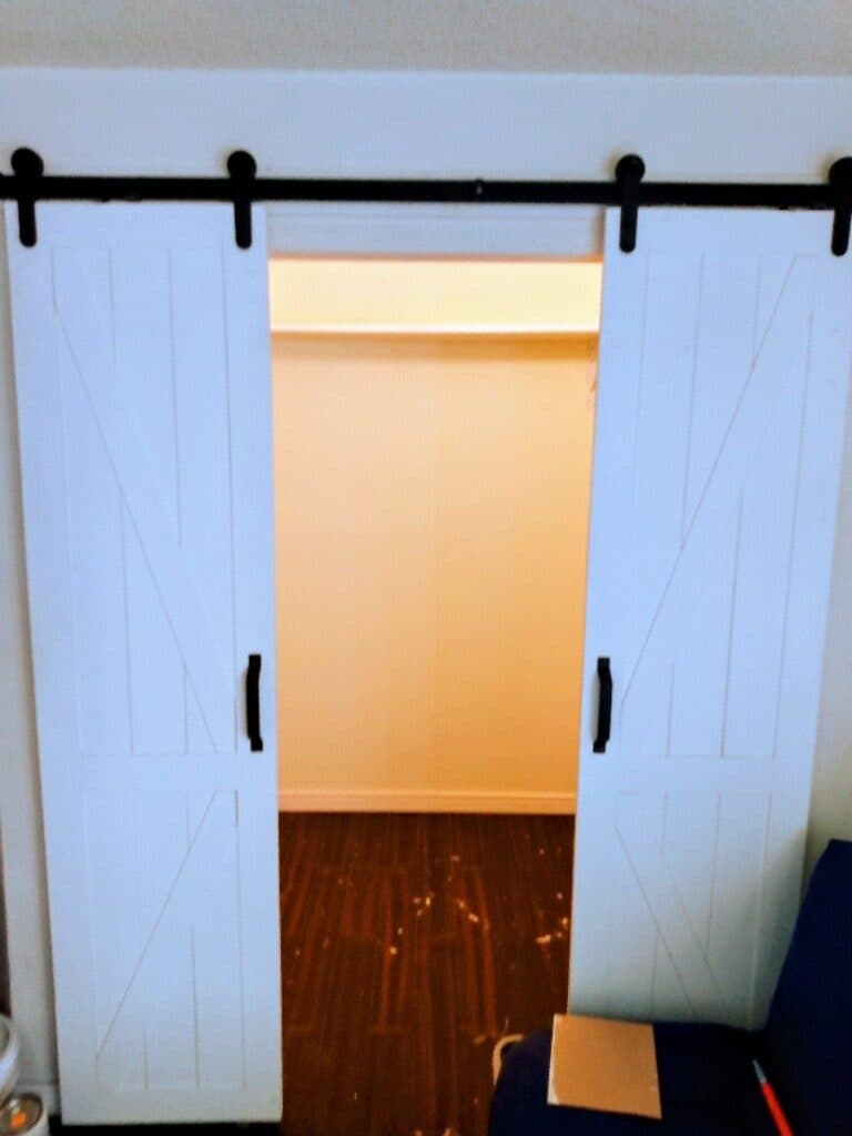 Completed: Custom barn-door closet conversion. Want one like this? Get a quote.